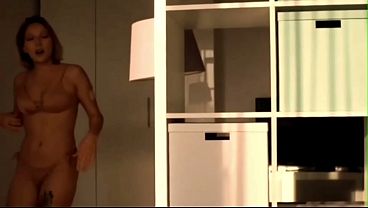 Hot woman in a bikini gets cumshot on her face.